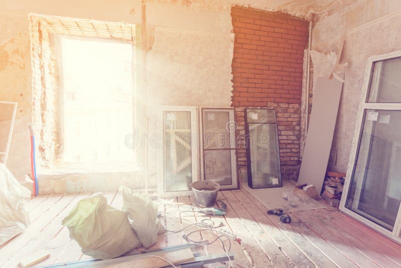 Working process of installing pvc windows in room of apartment is under construction, remodeling, renovation, extension. Restoration and reconstruction royalty free stock photo