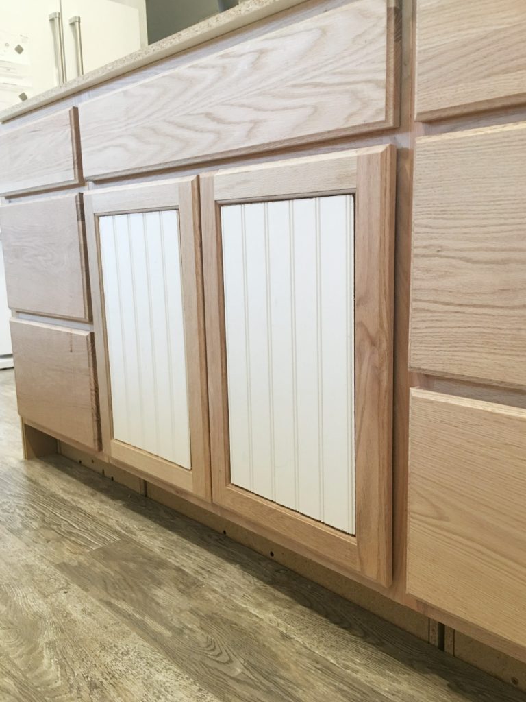 add beadboard to cabinets