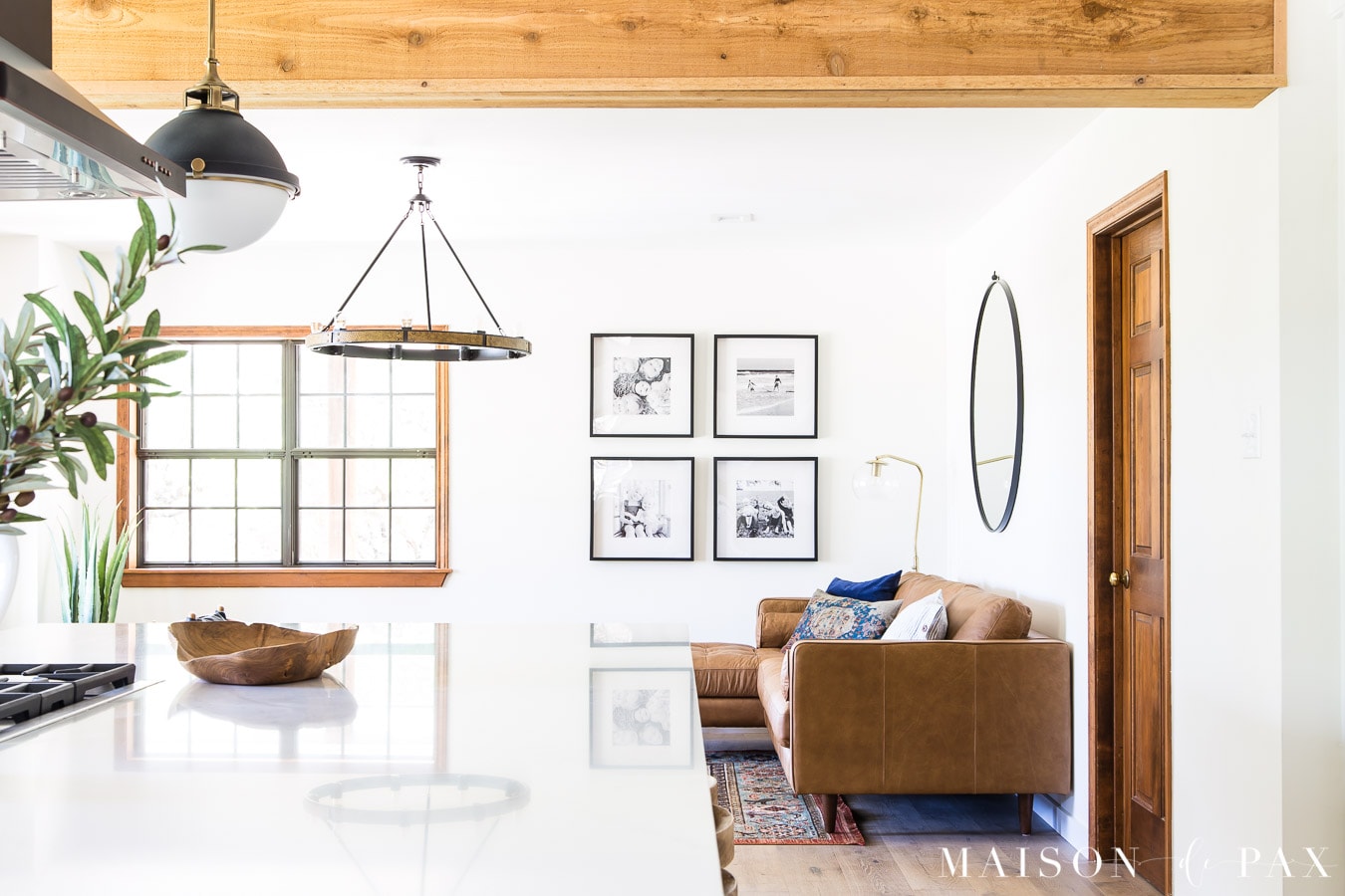 How to Decorate a Leather Sofa rustic beams, white walls, tan leather sectional